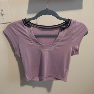 Pink top with visible stitching